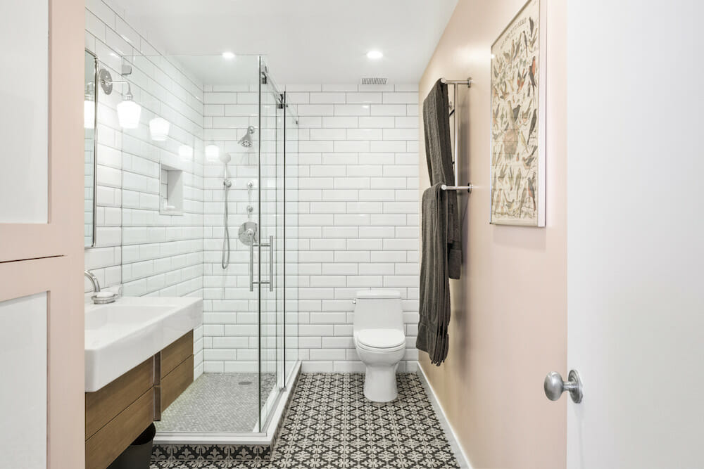 Bathroom renovation with tiled walls and glass shower